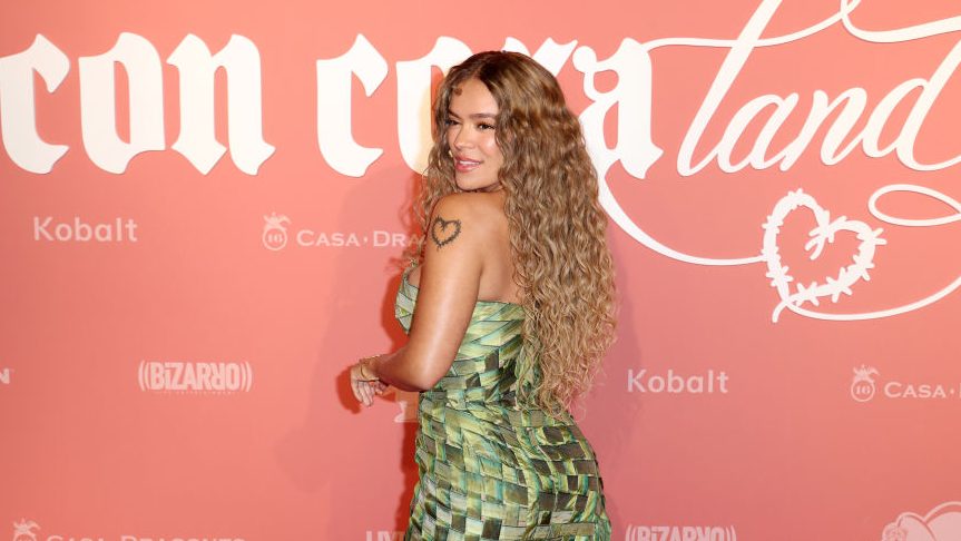 Karol G attends Karol G's Con Cora Foundation's Con Cora Land Benefit Gala